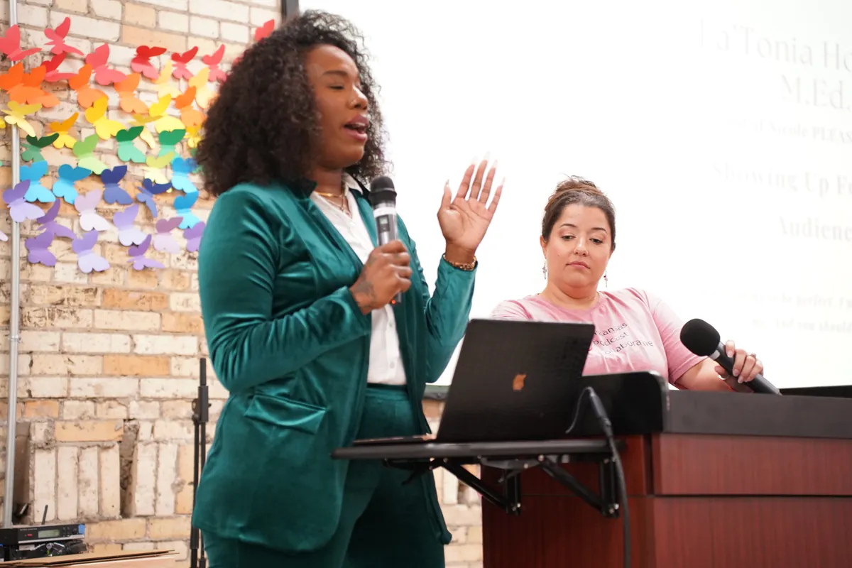 A speaker at the podium during ARKAST 2025