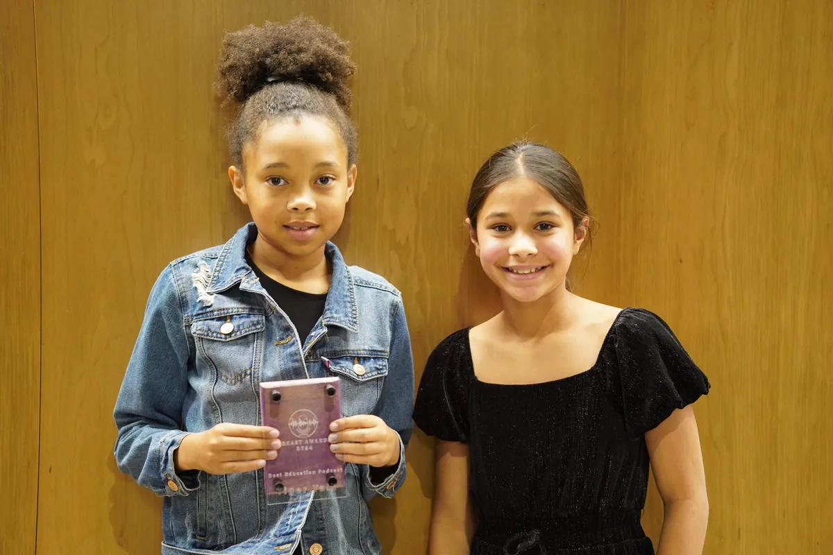 Young winners holding their trophies at the 2024 ARKAST Awards
